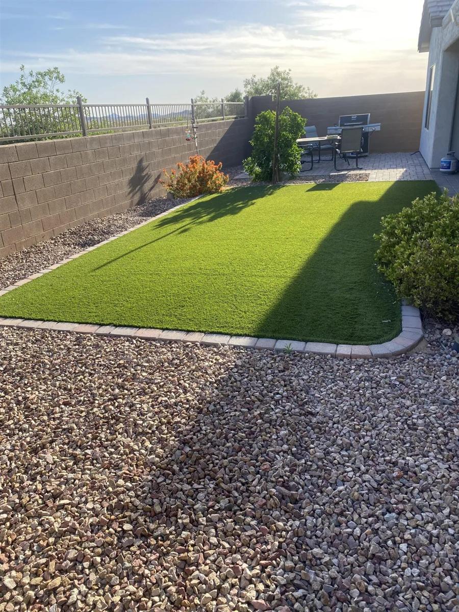 Clean artificial-turf backyard after service